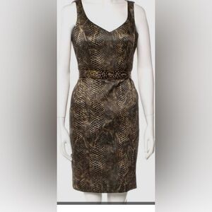 Cocktail dress Terri Jon size 12
• Sleeveless
• Textured material
Dry clean
